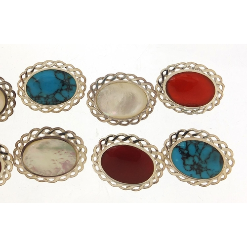 884 - Ten silver cabochon stone brooches including mother of pearl, turquoise and carnelian, 2.6cm wide, 5... 