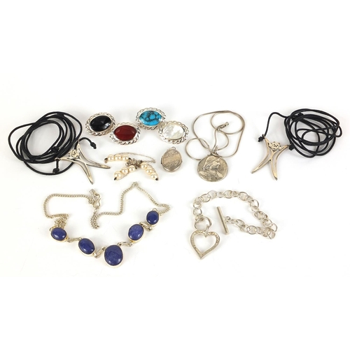 619 - Silver jewellery including four cabochon stone brooches, lapis lazuli necklace, locket, two monkey p... 