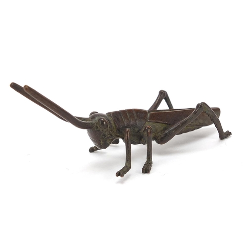 475 - Japanese patinated bronze locust, impressed marks to the base, 11cm in length