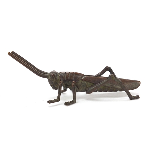 475 - Japanese patinated bronze locust, impressed marks to the base, 11cm in length