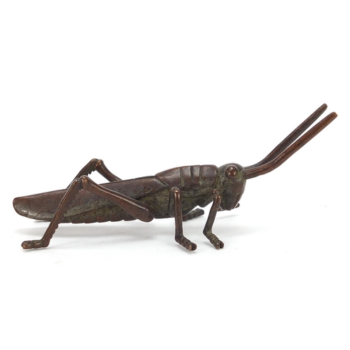 475 - Japanese patinated bronze locust, impressed marks to the base, 11cm in length