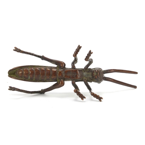 475 - Japanese patinated bronze locust, impressed marks to the base, 11cm in length