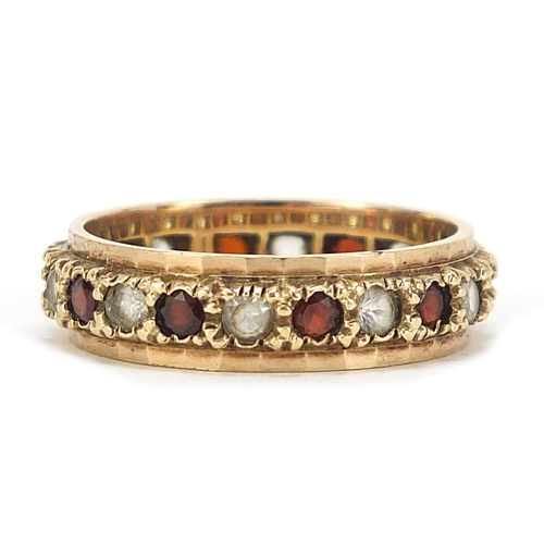 428 - 9ct gold red and clear stone eternity ring, size L, 2.8g