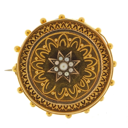 344 - Victorian unmarked gold seed pearl mourning brooch, 3.4cm in diameter, 12.2g