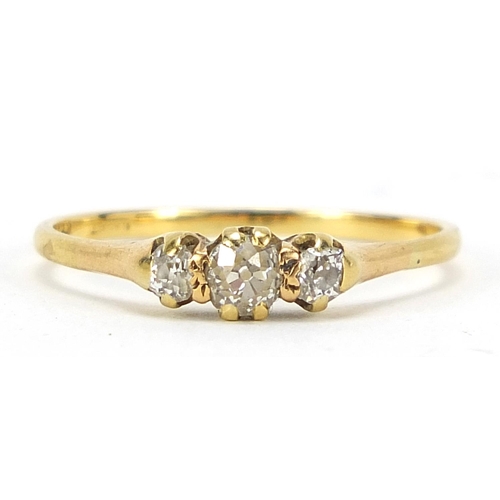 542 - 18ct gold diamond three stone ring, size U, 2.2g