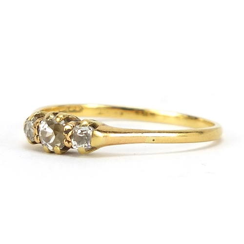 542 - 18ct gold diamond three stone ring, size U, 2.2g