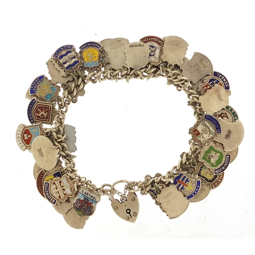 547 - Silver and enamel souvenir shield charm bracelet, 74.5g