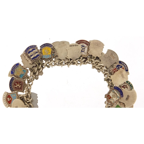 547 - Silver and enamel souvenir shield charm bracelet, 74.5g