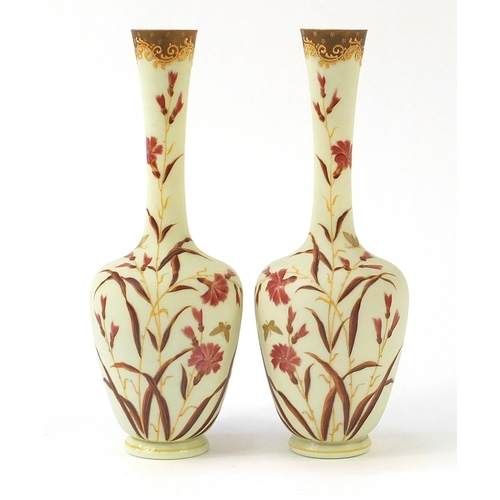 79 - Pair of 19th French century opaline glass vases hand painted with flowers, each 40cm high