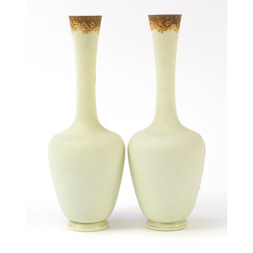 79 - Pair of 19th French century opaline glass vases hand painted with flowers, each 40cm high