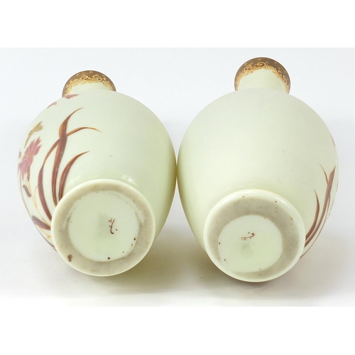 79 - Pair of 19th French century opaline glass vases hand painted with flowers, each 40cm high