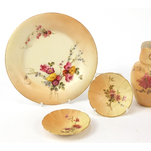 75 - Royal Worcester blush ivory comprising three jugs, pair of dishes and a side plate, each decorated w... 