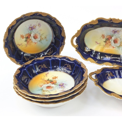 898 - Bavarian gilt and blue ground floral desert service including serving bowls and plates, the largest ... 