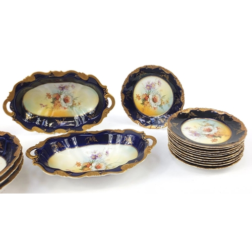 898 - Bavarian gilt and blue ground floral desert service including serving bowls and plates, the largest ... 