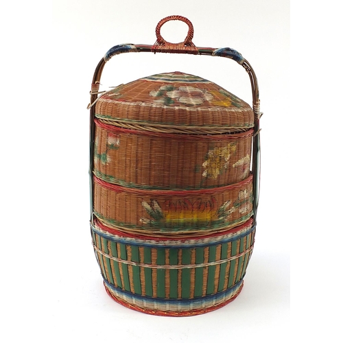 937 - Oriental four section wicker food container hand painted with fish and flowers, 72cm high