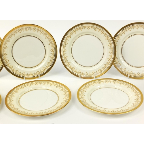 899 - Fourteen Aynsley Gold Dowery 10.5 inch dinner plates and two 9.5 inch soup bowls