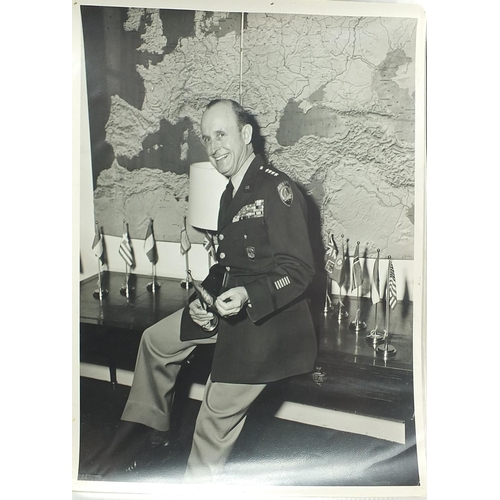 952 - Collection of military interest press photographs arranged in an album including Eisenhower