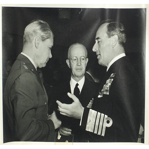 952 - Collection of military interest press photographs arranged in an album including Eisenhower