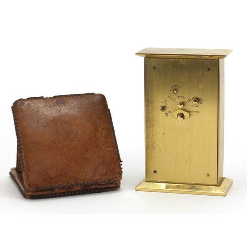 485 - Swiza eight day desk clock and a leather cased travel clock, the largest 14.5cm high