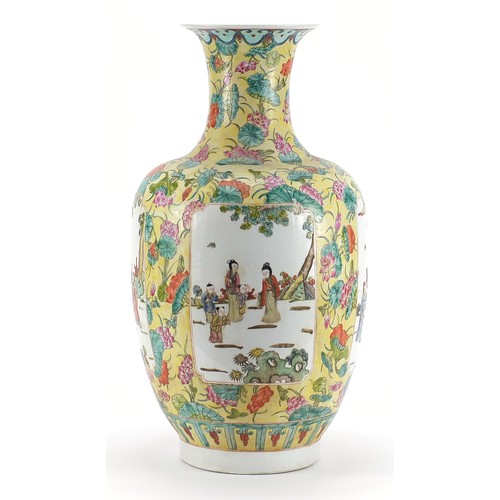 1001 - Large Chinese porcelain vase hand painted in the famille rose palette with panels of figures and flo... 