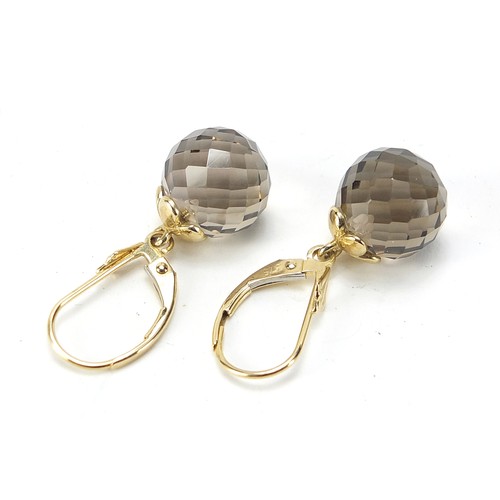 553 - Pair of 9ct gold smoky quartz drop earrings, 3cm high, 4.0g