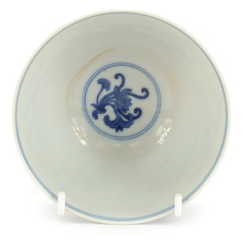 711 - Chinese blue and white porcelain bowl hand painted with flowers, six figure character marks to the b... 