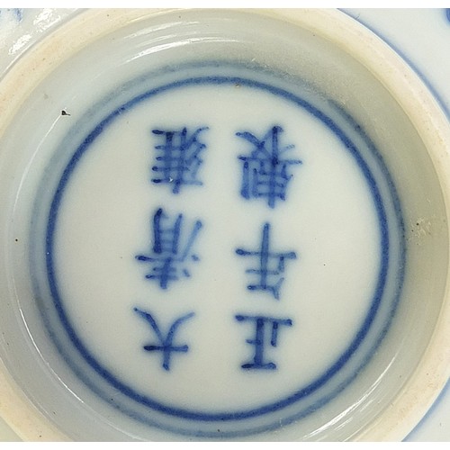 711 - Chinese blue and white porcelain bowl hand painted with flowers, six figure character marks to the b... 