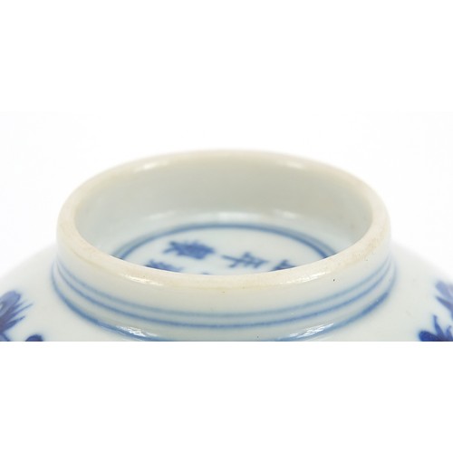 711 - Chinese blue and white porcelain bowl hand painted with flowers, six figure character marks to the b... 