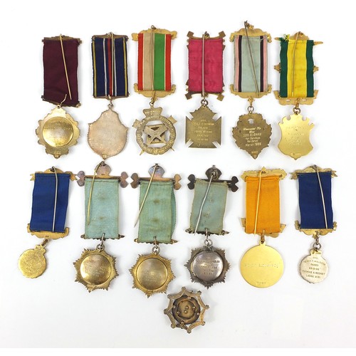 236 - Thirteen Royal Order of Buffalo silver and enamel jewels, mostly gilt including examples presented t... 