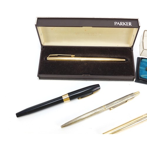 240 - Vintage and later pens and pencils including Sheaffer and Parker, one with gold nib