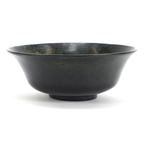 133 - Chinese spinach green jade bowl, 13.5cm in diameter