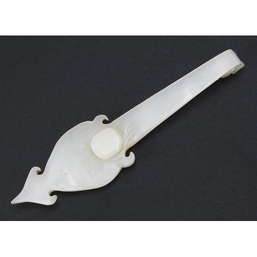 565 - Chinese carved white jade belt hook, 16cm in length