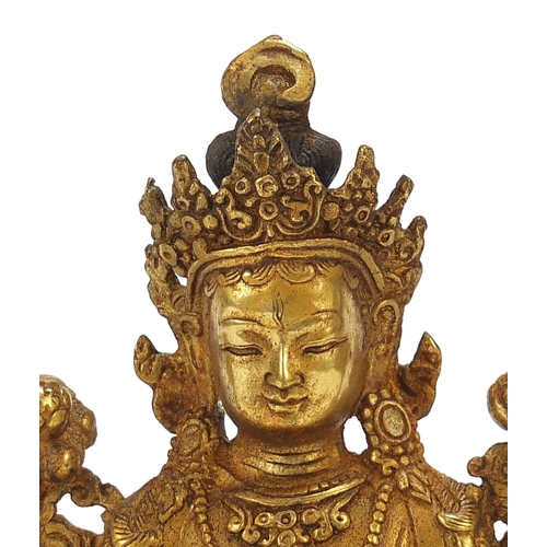 259 - Chino Tibetan gilt bronze figure of seated Buddha, 20cm high