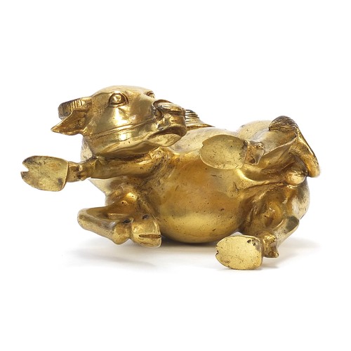 291 - Chinese gilt bronze figure of two boys on a water buffalo, 14cm high