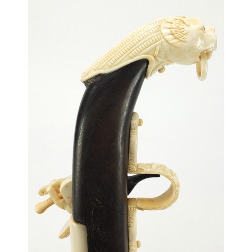 354 - Indian style hardwood and carved bone walking stick in the form of a rifle, 92cm in length