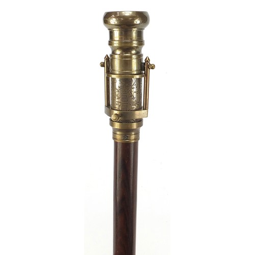 356 - Hardwood walking stick with brass compass and two draw telescope pommel, 96cm in length