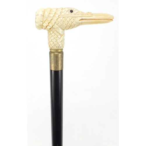 360 - Hardwood walking stick with carved bone duck design handle, 91.5cm in length