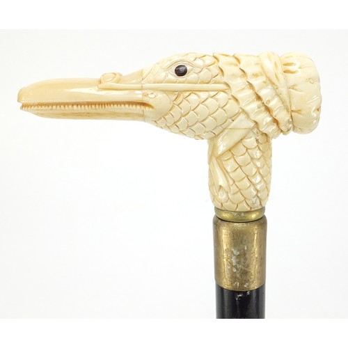 360 - Hardwood walking stick with carved bone duck design handle, 91.5cm in length