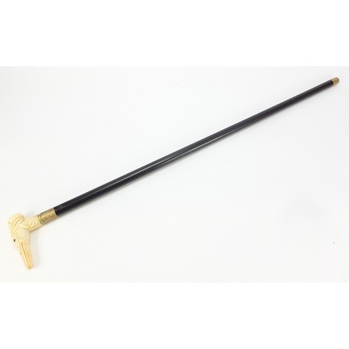 360 - Hardwood walking stick with carved bone duck design handle, 91.5cm in length