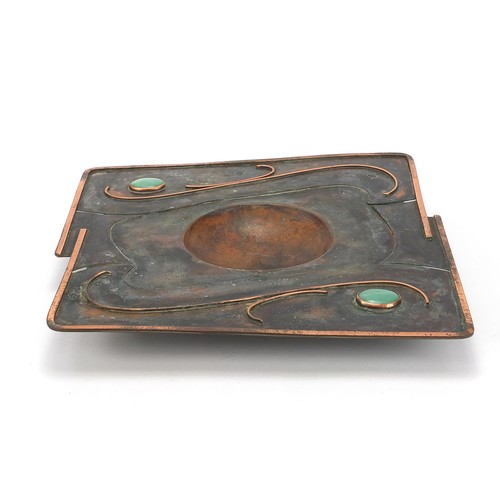 528 - Sam Fanaroff, Arts & Crafts style copper centre bowl with green stone cabochons, 40cm x 39cm