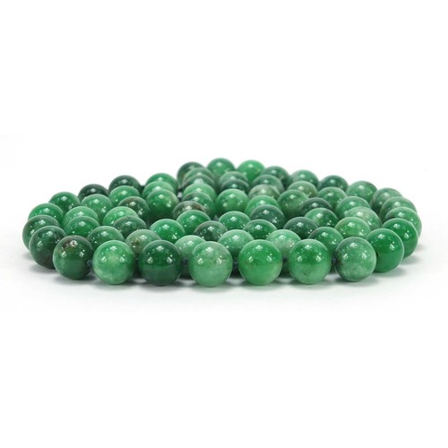 721 - Chinese green hardstone bead necklace, possibly jade, each bead approximately 1.5cm in diameter, app... 