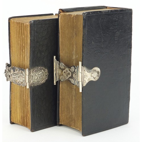 961 - Two 19th century Dutch leather bound books with silver mounts