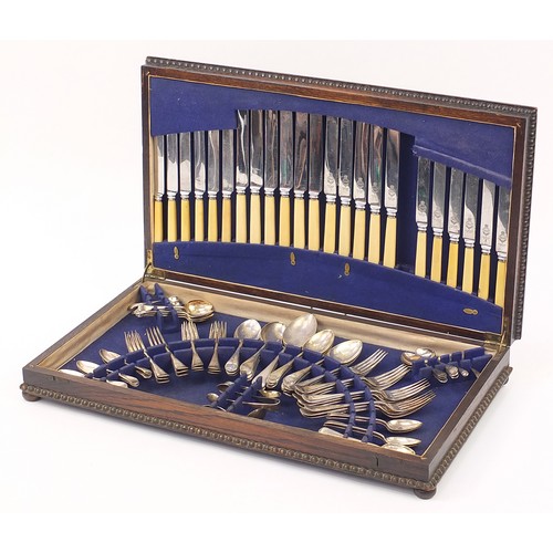 1081 - Oak twelve place canteen of silver plated cutlery, the canteen 65.5cm wide (one knife missing)