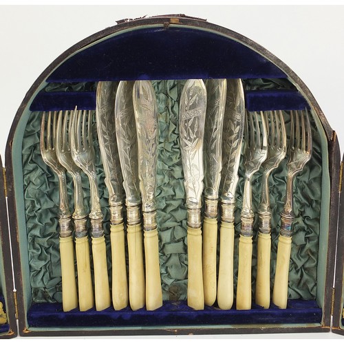 1085 - Silverplate comprising set of six Victorian aesthetic knives and forks with ivory handles housed in ... 