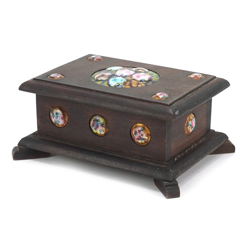 534 - Arts & Crafts hardwood casket with enamelled roundels, 8cm H x 17cm W x 12cm D