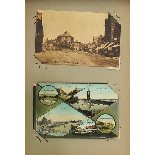 437 - Edwardian and later postcards arranged in an album, including military interest silk, French silk sw... 