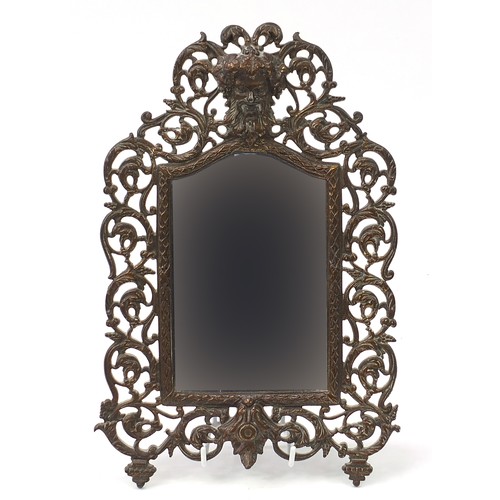 604 - 19th century gilt metal acorn man design mirror with bevelled plate, B & H 3504 to the reverse, 38.5... 