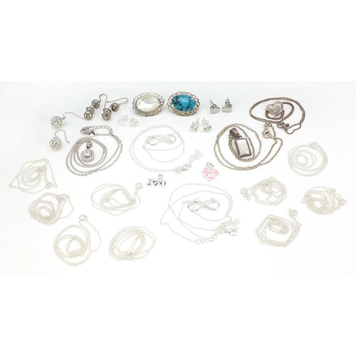 1029 - Silver jewellery including turquoise and mother of pearl brooch, necklaces and earrings, total 53.0g