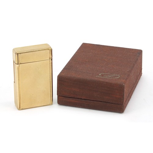 752 - S J Dupont, gold plated pocket lighter with engine turned decoration with box and paperwork, 6cm hig... 