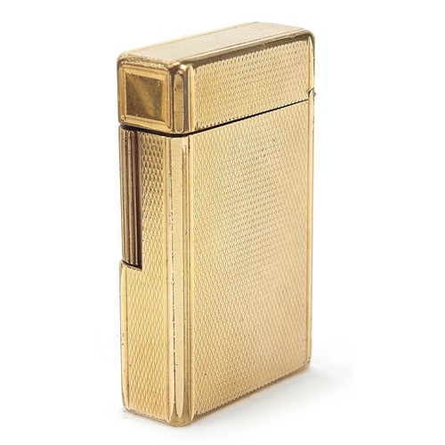 752 - S J Dupont, gold plated pocket lighter with engine turned decoration with box and paperwork, 6cm hig... 